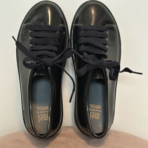 Super cool Melissa black closed toe shoes with laces! Size 1.